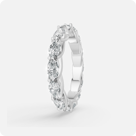 Oval Cut Diamond Vine Eternity Band with oval diamonds and vine prong setting