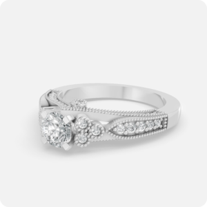 Vintage milgrain diamond engagement ring with round center stone in white gold